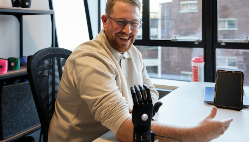 NWG Relationship Manager Louis Spence trialling a bionic arm