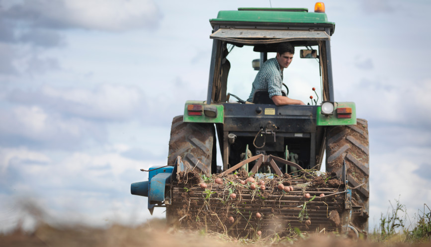 Man driving tractor Man driving tractor