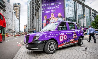 Team GB imagery on a taxi, outside NatWest office at Bishopsgate, London’